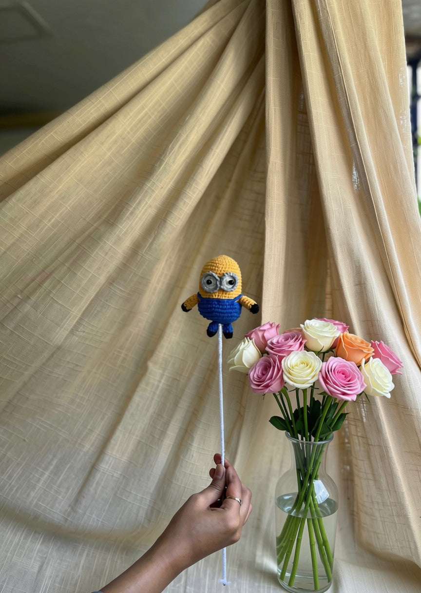 Minion Stick, hand-crocheted by Mindori