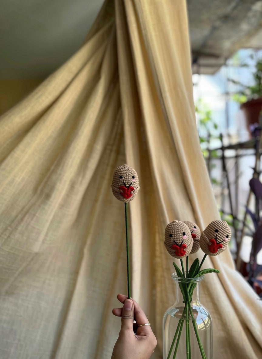 Positive Potato Stick, hand-crocheted by Mindori